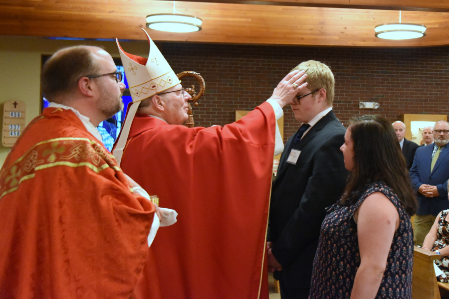 Receiving the sacrament of confirmation