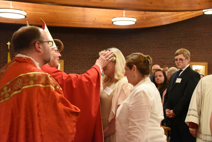 Receiving the sacrament of confirmation