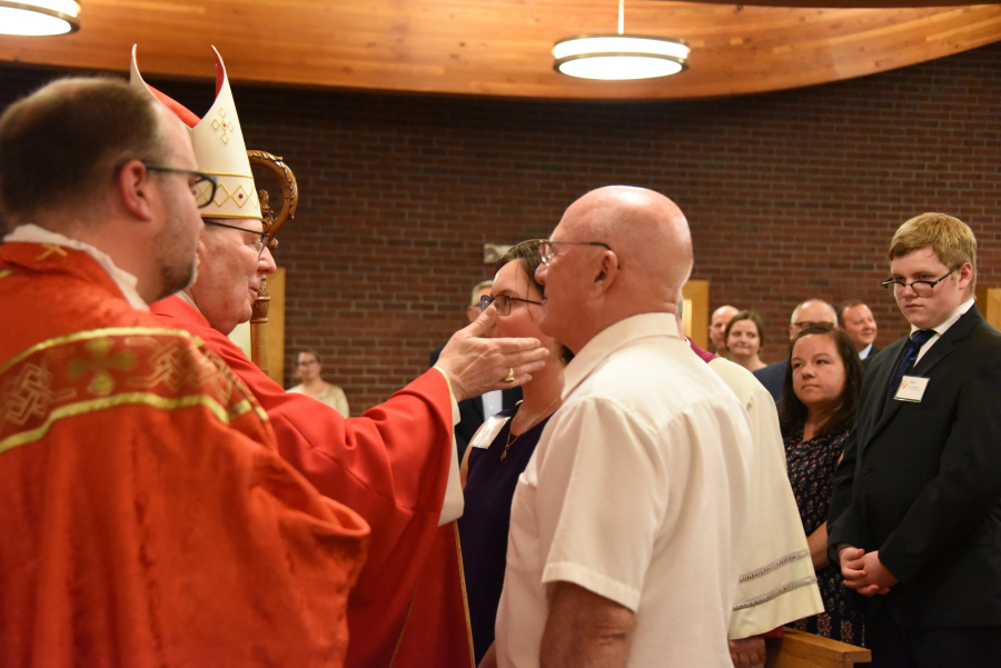 Receiving the sacrament of confirmation