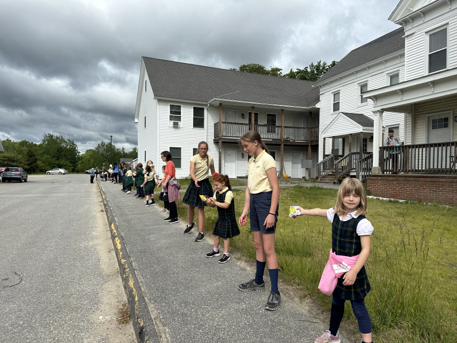 St. John's Human Chain to Mid Coast Hunger Prevention Program in Brunswick 