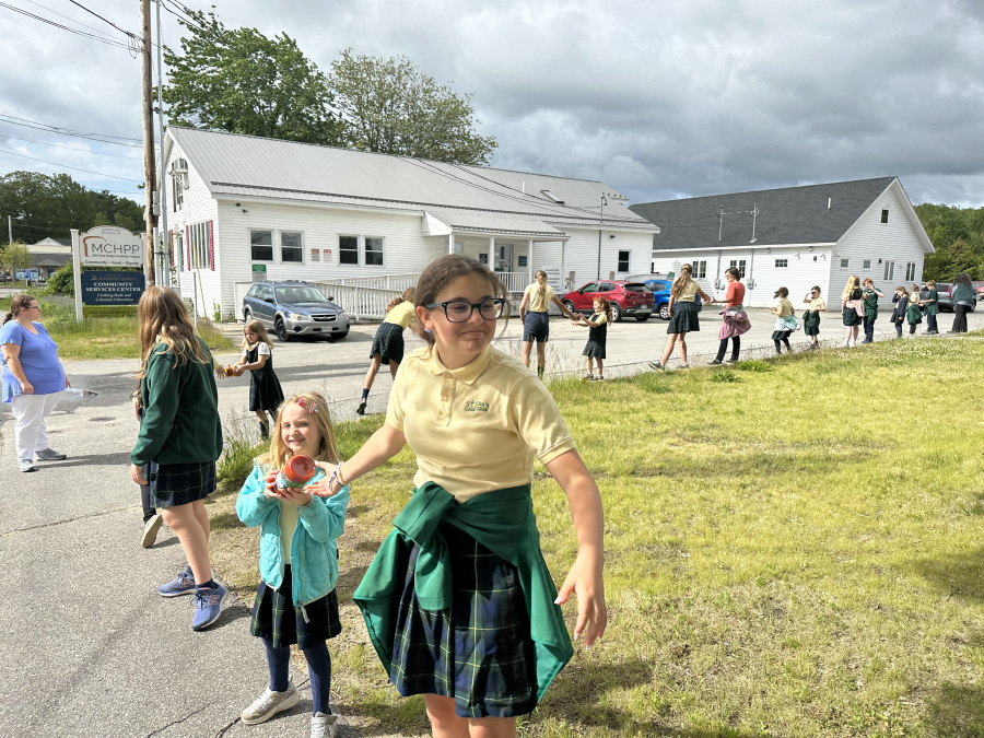 St. John's Human Chain to Mid Coast Hunger Prevention Program in Brunswick 