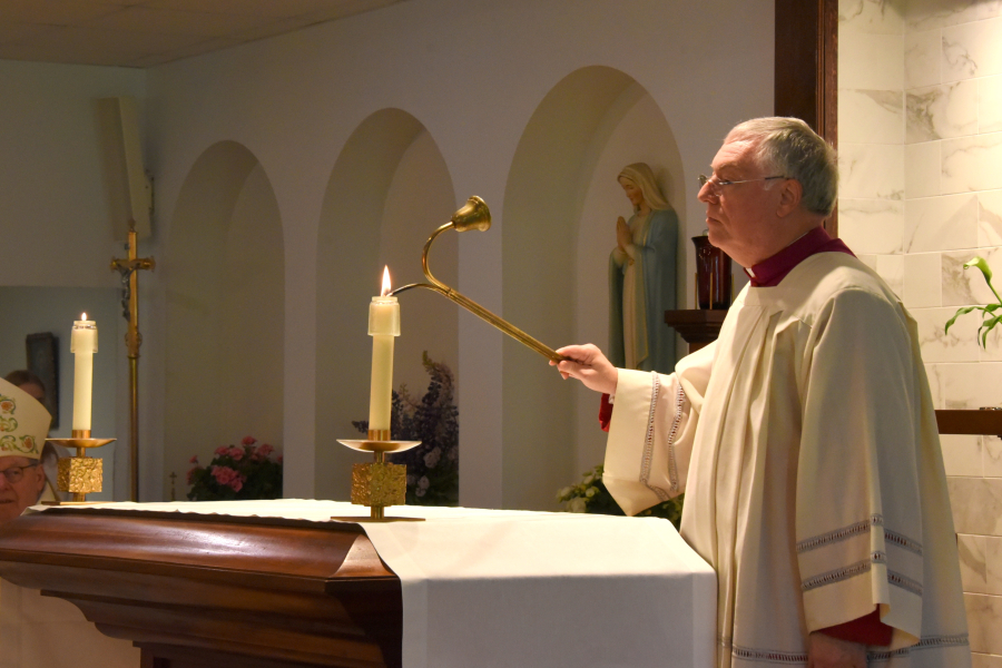 Lighting the candles.