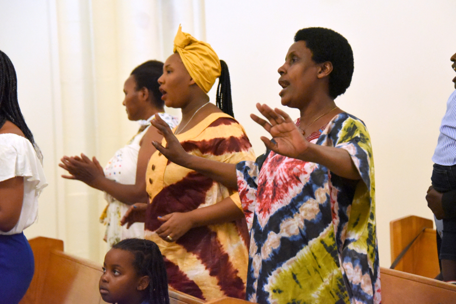 Parishioner singing and dancing