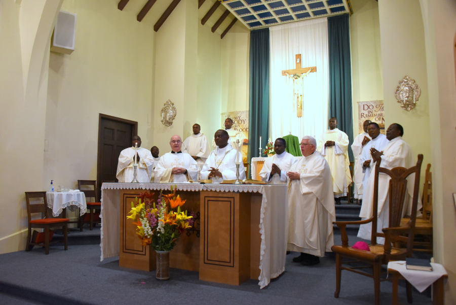 Sanctuary of the church with the bishop and priests