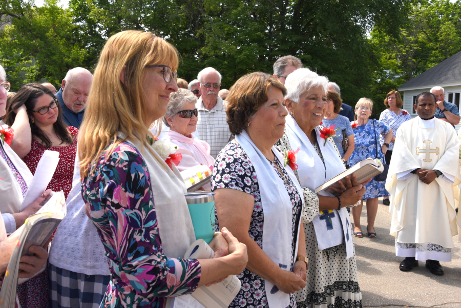 Parishioners outside Our Lady of Ransom Church