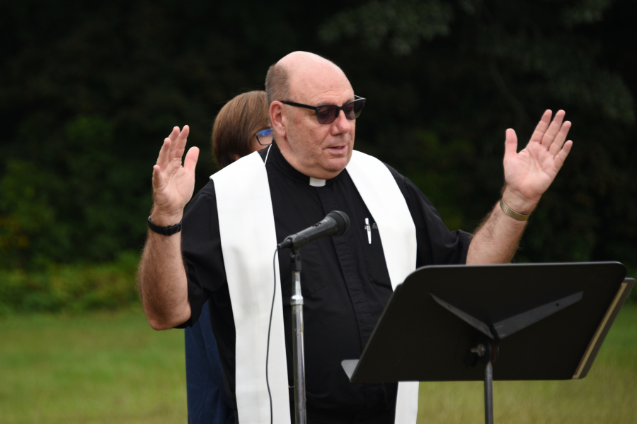 Father Wilfred Labbe blessing