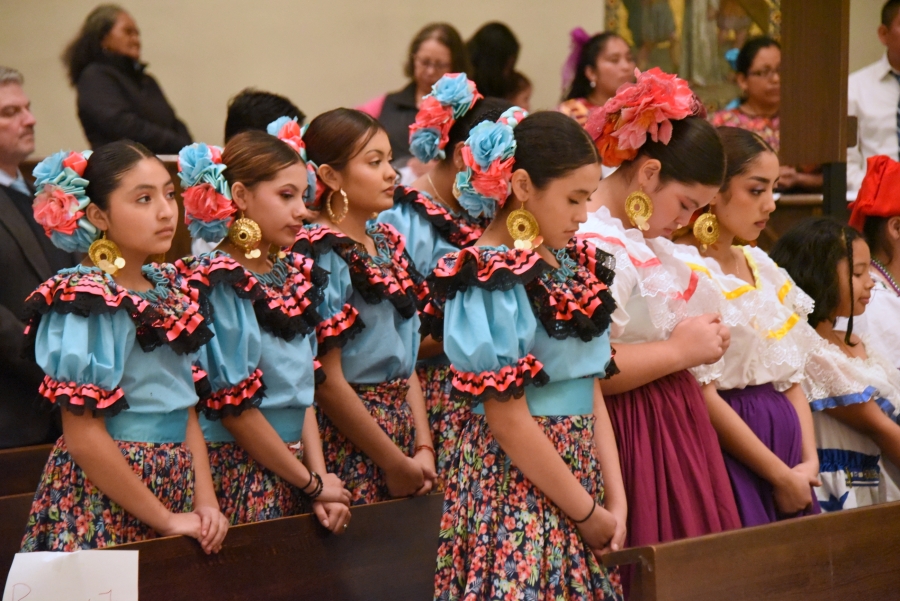 Parishioners in colorful outfits