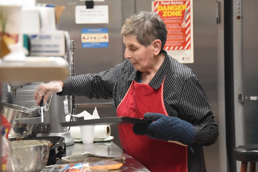 Woman making sausages