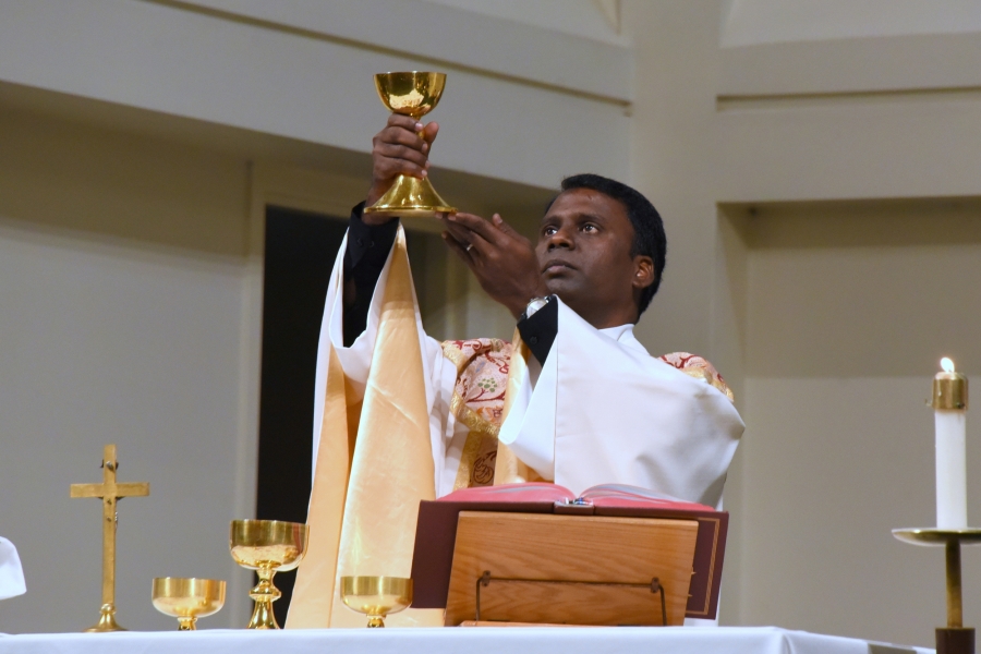  Father Elaiyaraja Thaniyel, HGN celebrating the Eucharist.