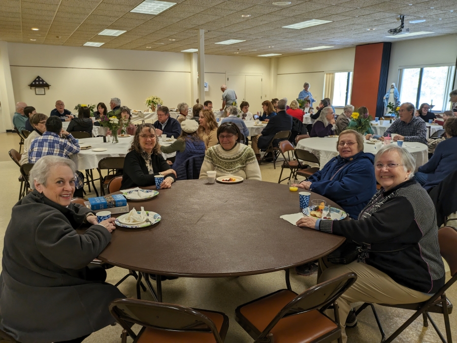 Group seating at a round dining table