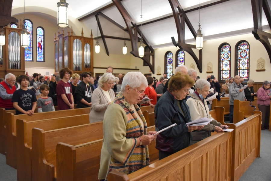 Sisters of St. Joseph of Lyon sit in the front pew.