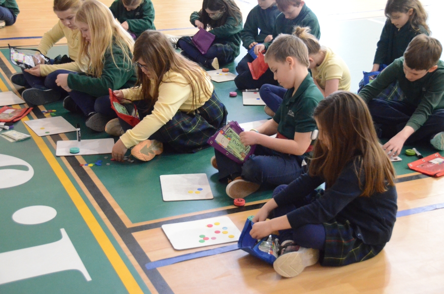 Students play Catholic bingo at St. John's.