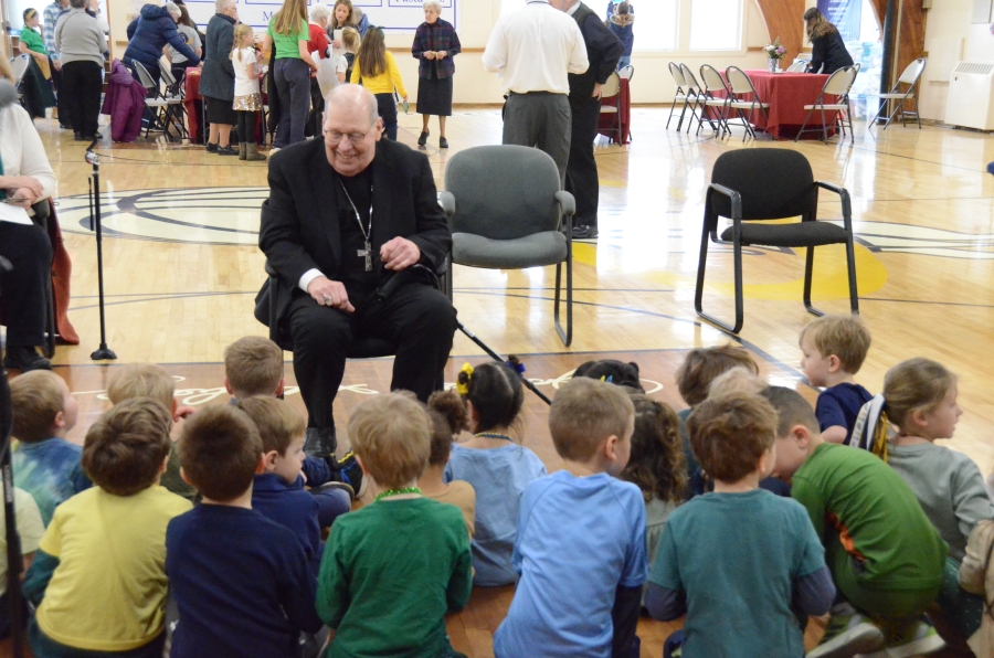 Bishop talking to students