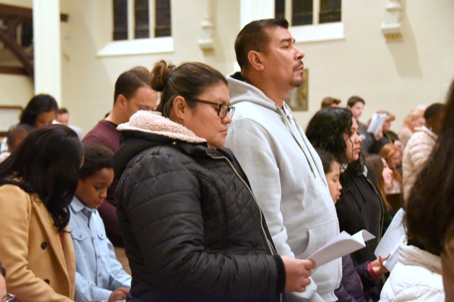 Two people standing - Rite of Election - Cathedral of the Immaculate Conception