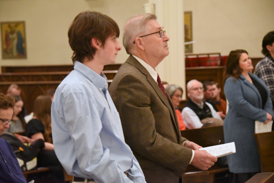 Two people standing - Rite of Election - Cathedral of the Immaculate Conception