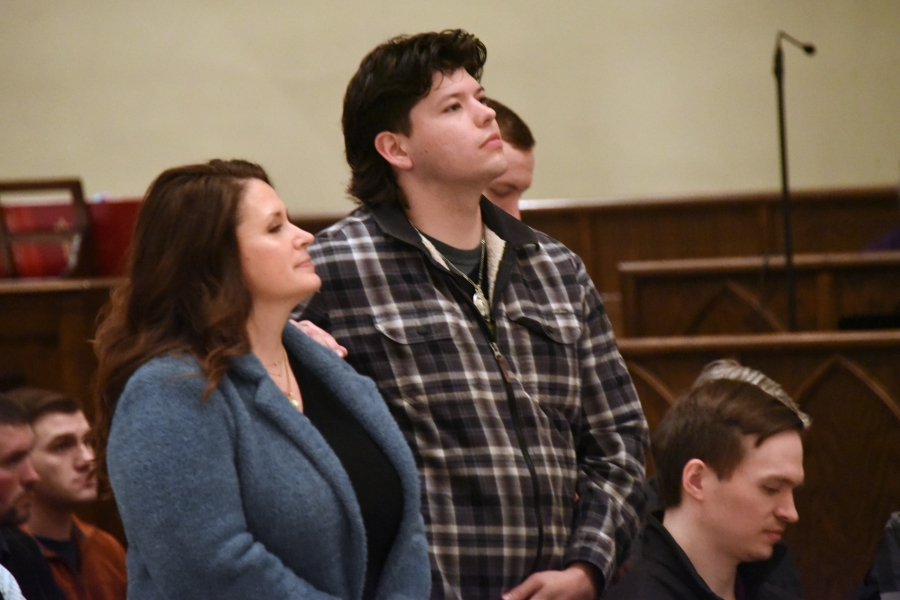 Two people standing - Rite of Election - Cathedral of the Immaculate Conception