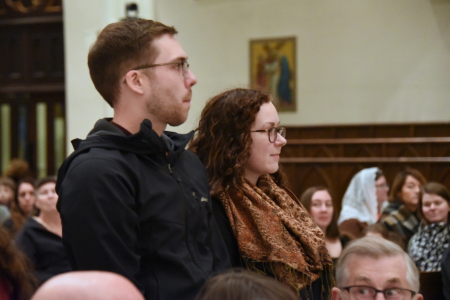 Two people standing - Rite of Election - Cathedral of the Immaculate Conception