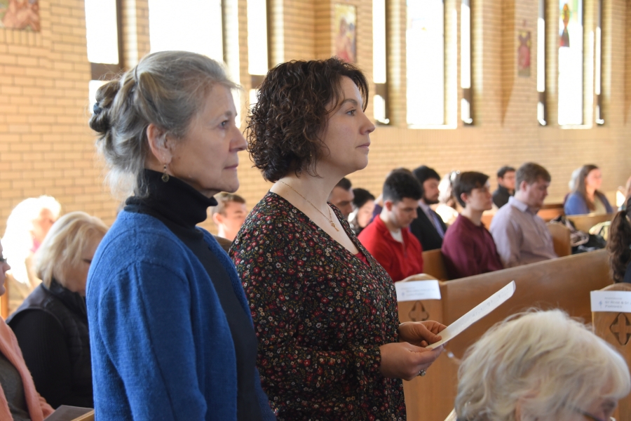 Two women standing at Rite of Election - Winslow