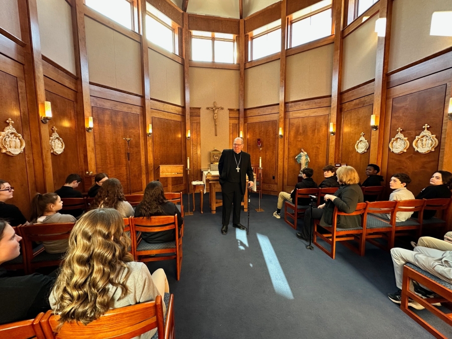 Bishop in chapel with students