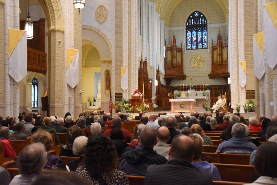 Crowd looks on as Bishop Deeley delivers remarks.