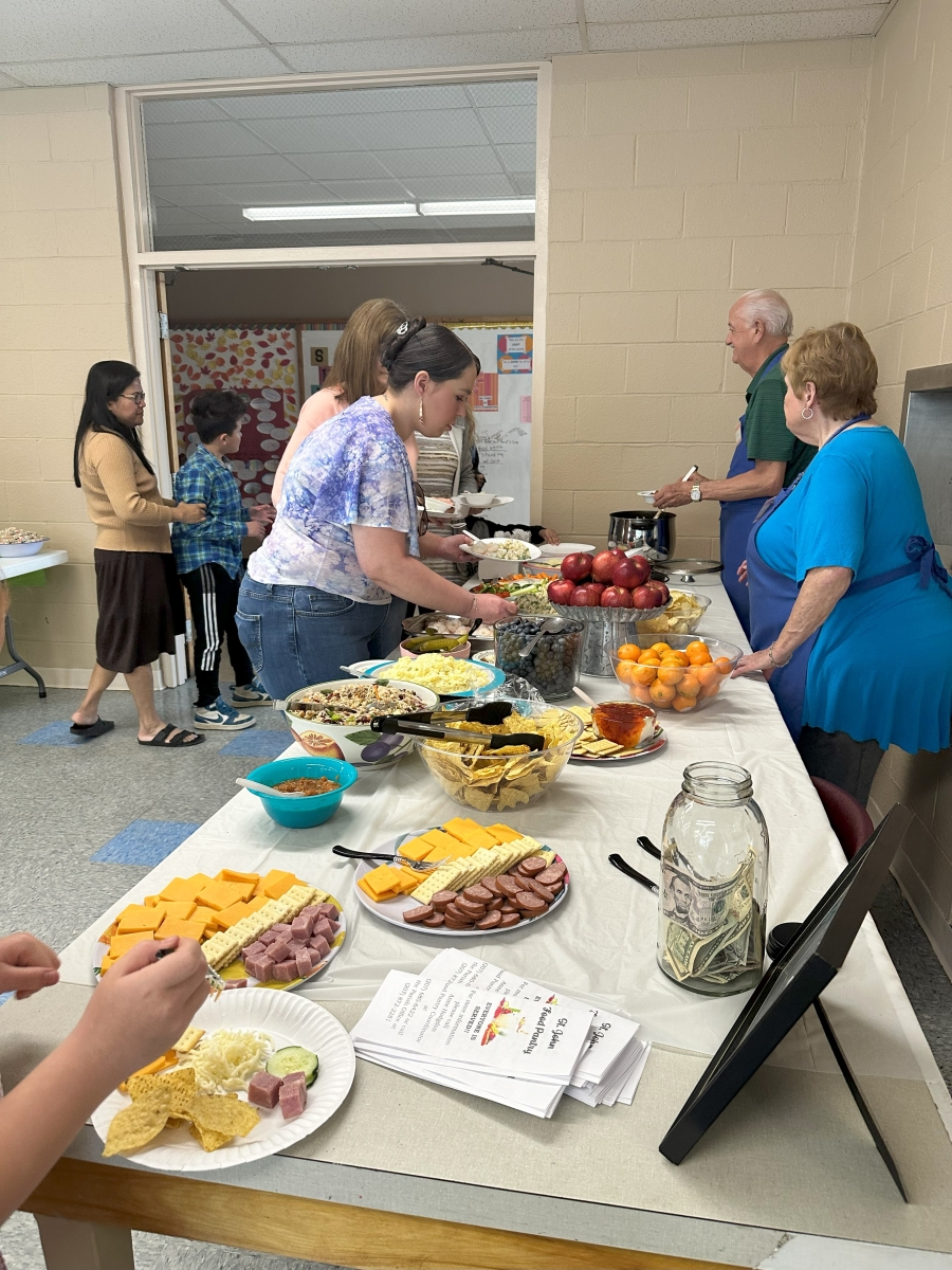 people lining up for food 