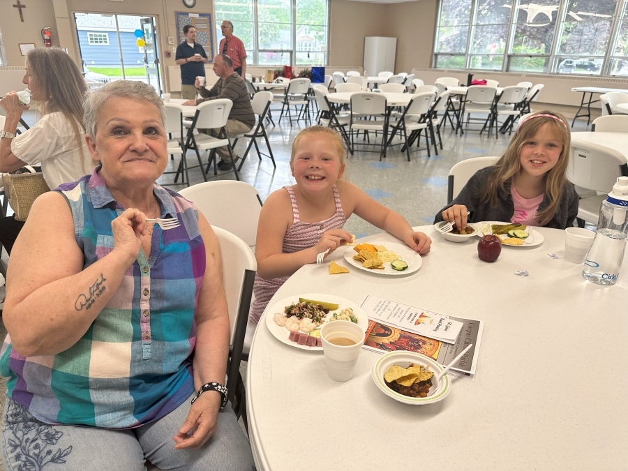 people eating food at the celebration