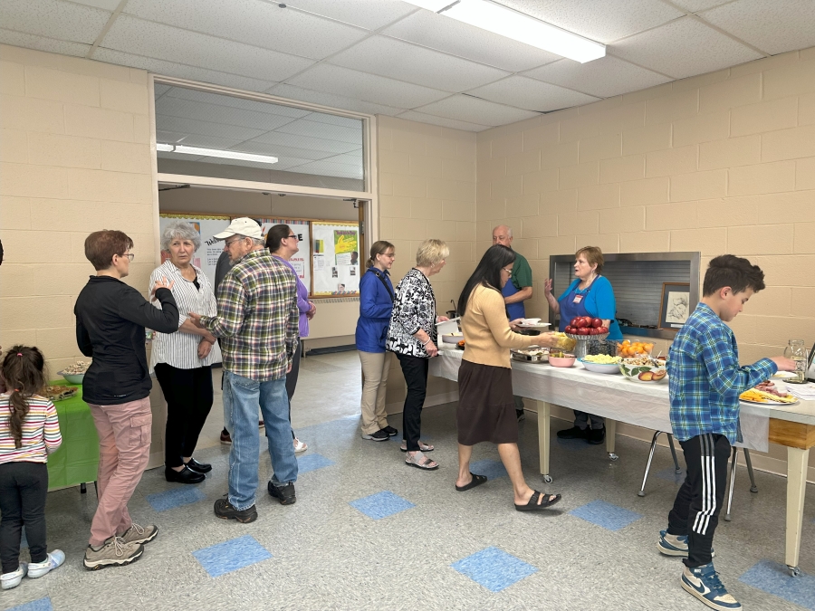 people lining up for food 