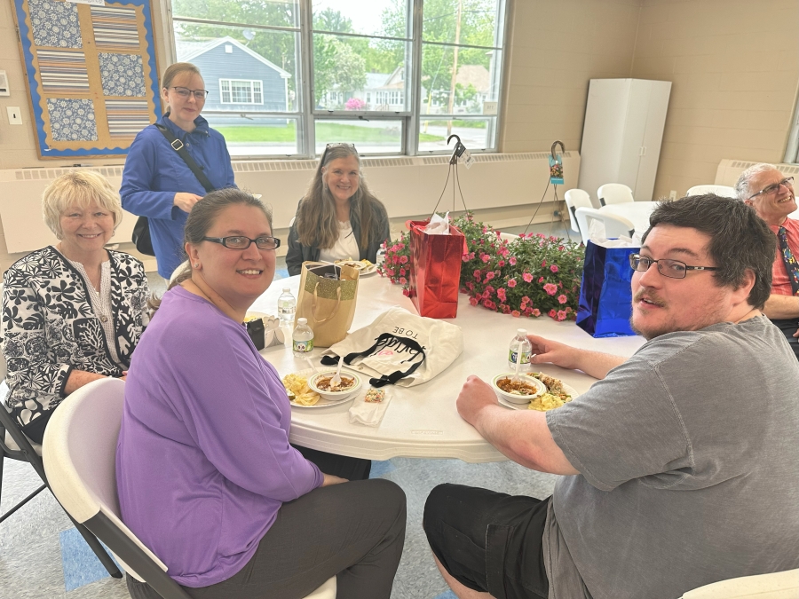 Community celebrating the opening of the St. John the Baptist Food Pantry