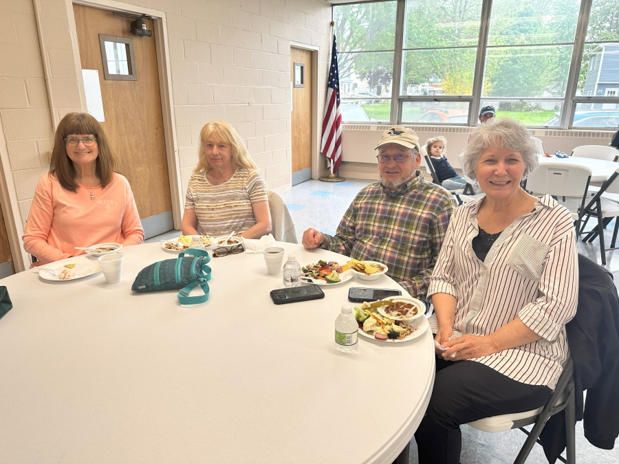 Community celebrating the opening of the St. John the Baptist Food Pantry