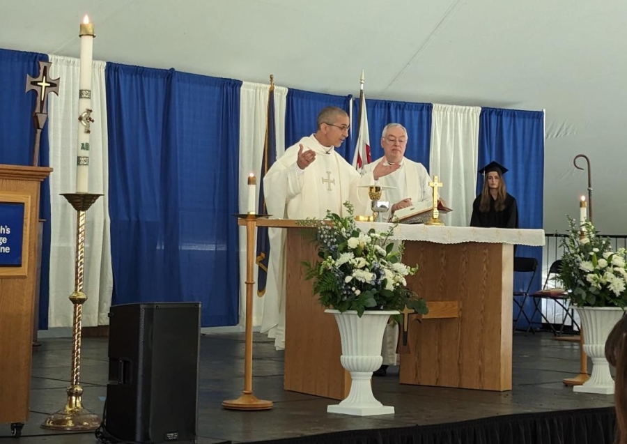 Two priests at the altar