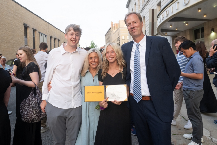 graduate with their family 