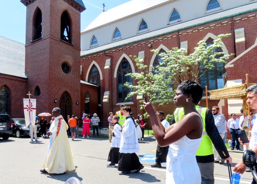 people walking in the Feast of Corpus Christi Procession