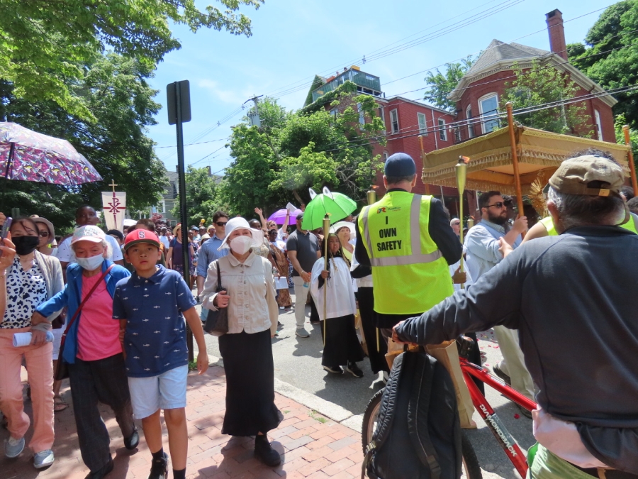 people walking in the Feast of Corpus Christi Procession