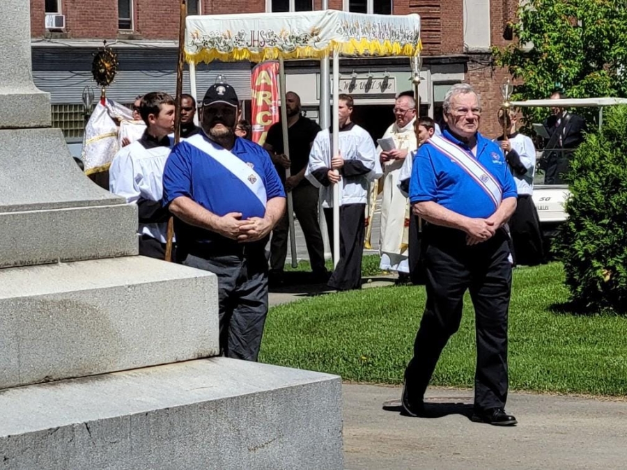 people walking in the Feast of Corpus Christi Procession