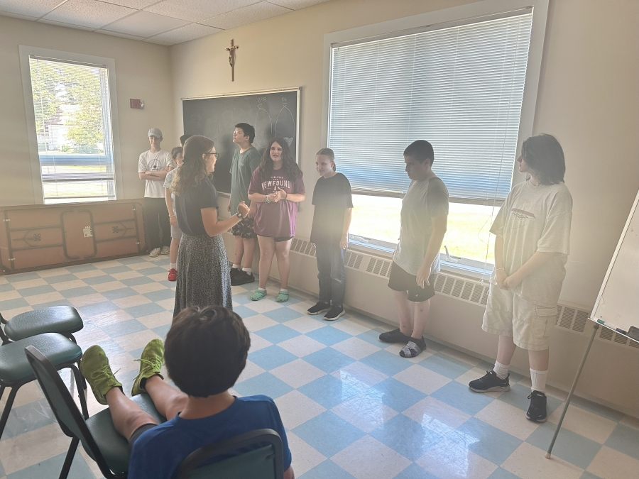 Totus Tuus campers inside a classroom