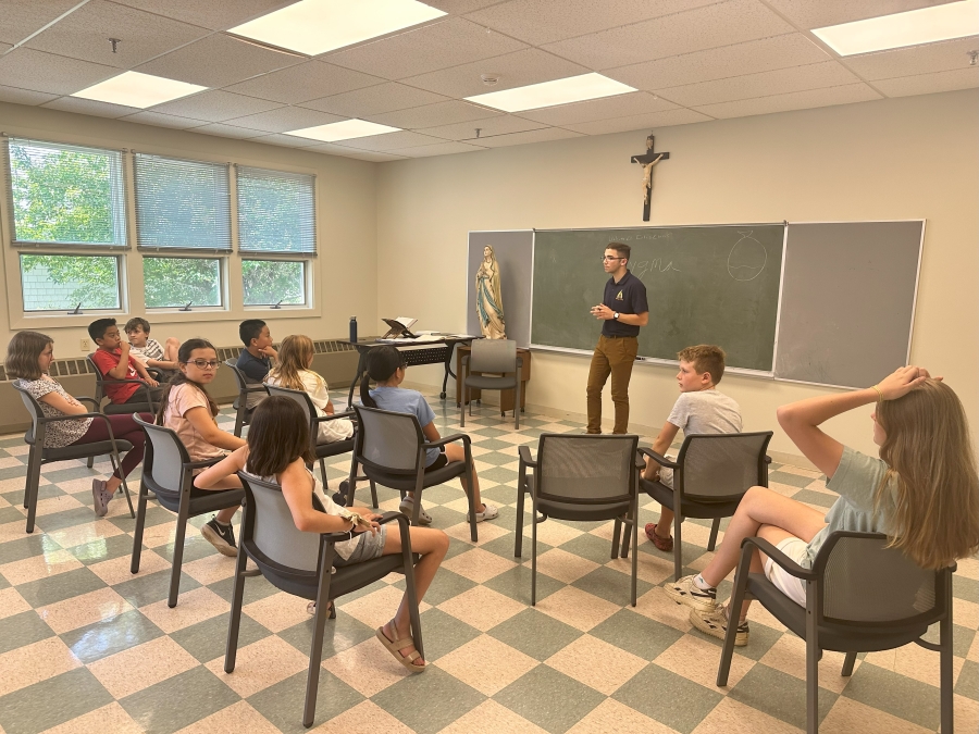 Totus Tuus campers inside a classroom