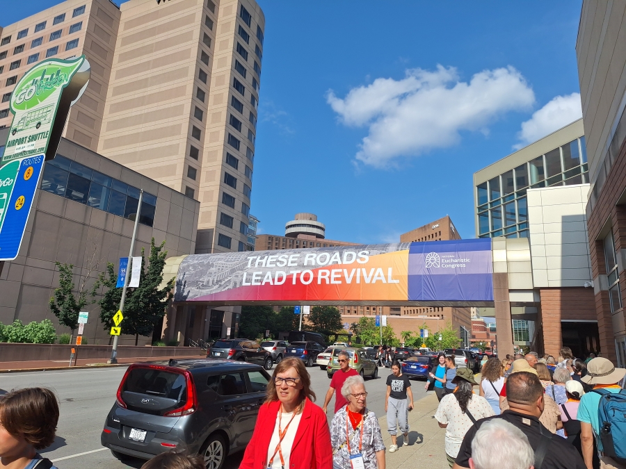 signs outside of the National Eucharistic Congress