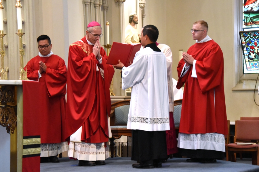 Bishop Ruggieri shares the opening prayer.
