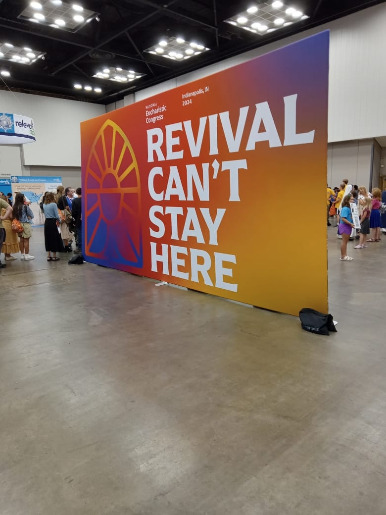 sign at the 10th National Eucharistic Congress