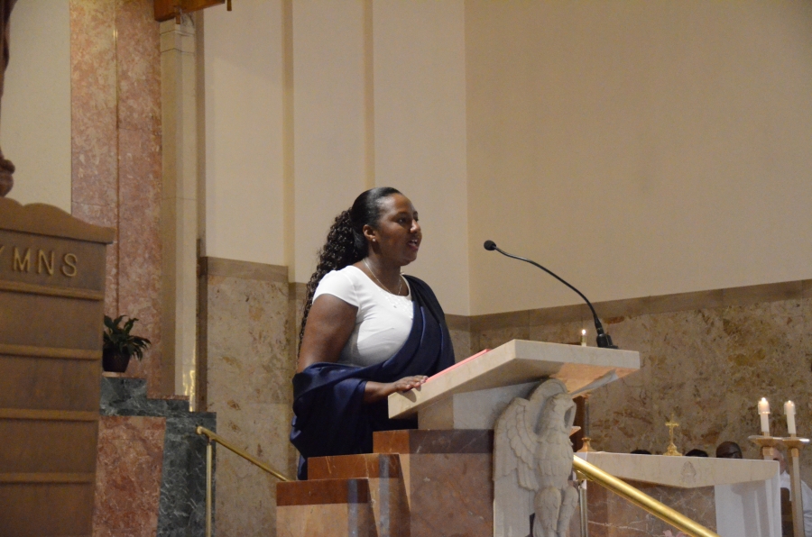 Woman speaking at microphone