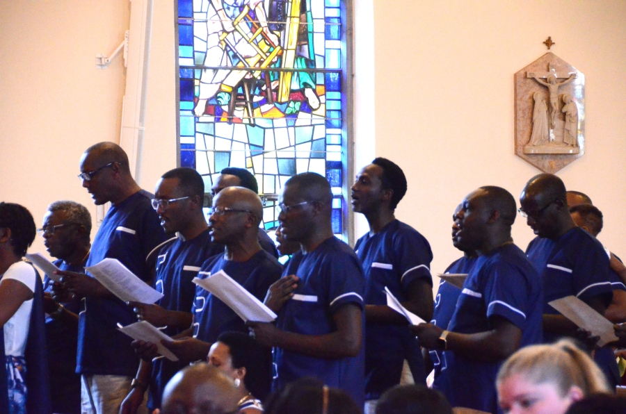 Male choir members singing