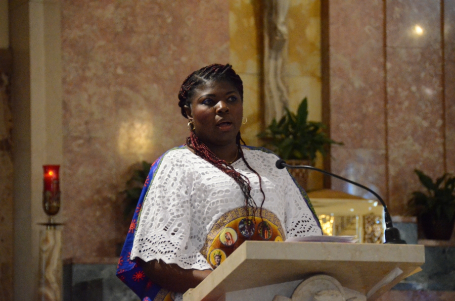 Woman speaking at microphone