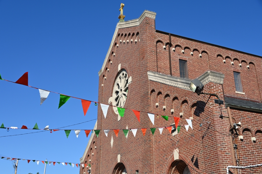 St. Peter's Church with a red, white, and green streamer.