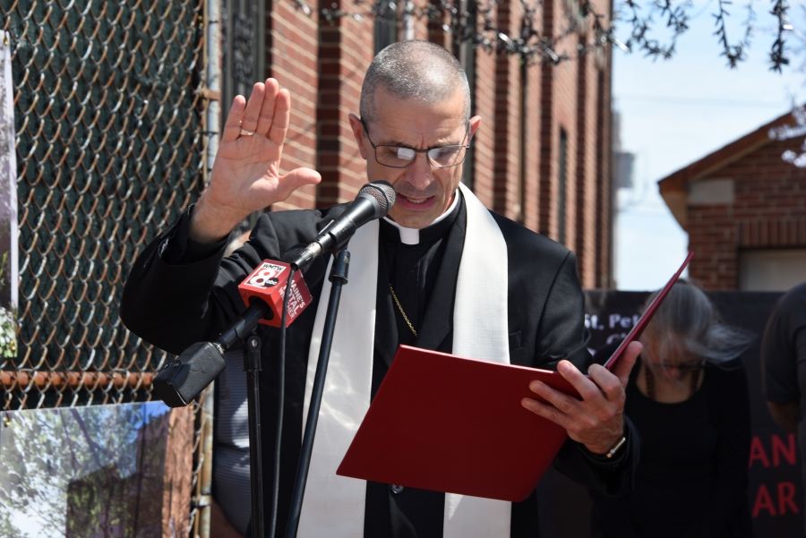 Bishop James Ruggieri offers a blessing.