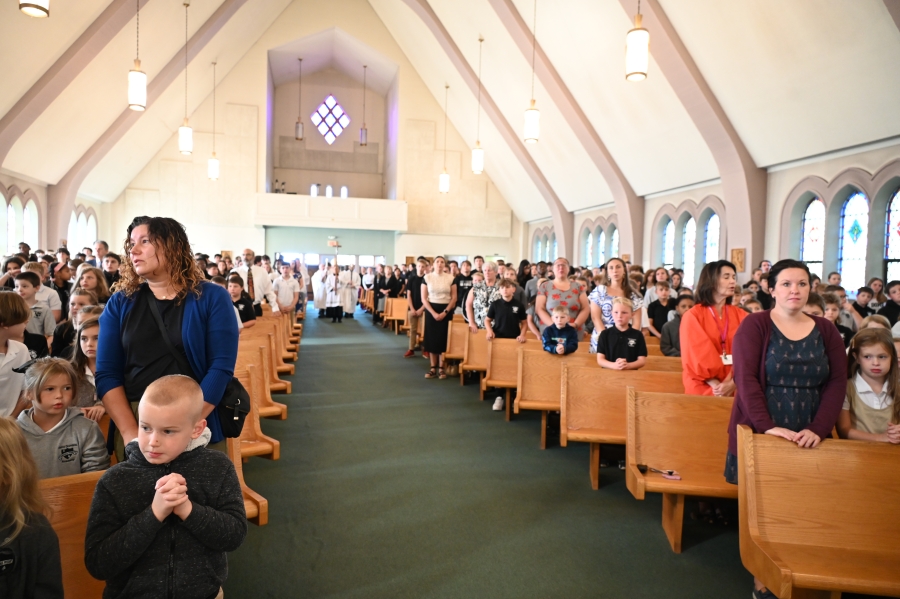 students sitting in church