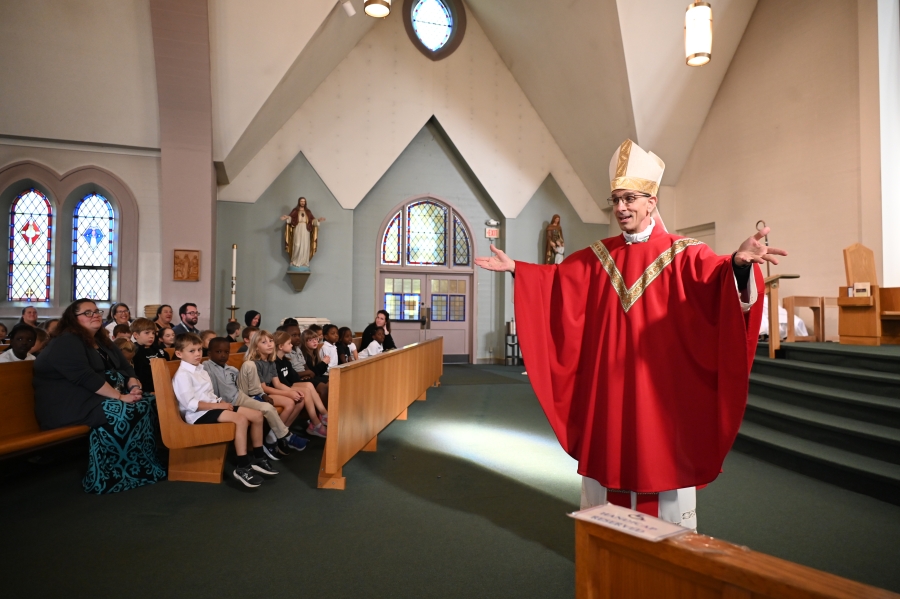 Bishop Ruggieri in front of the church 