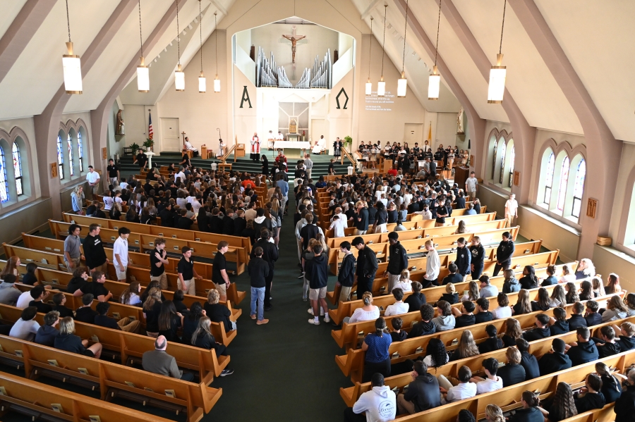 large view of Mass with students in the pews