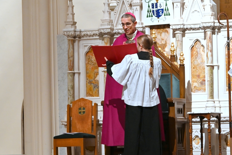 Bishop James Ruggieri with an altar server.