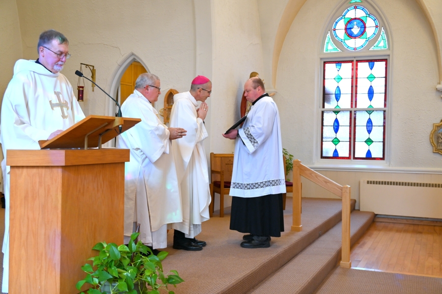 Bishop James Ruggieri offers a blessing.