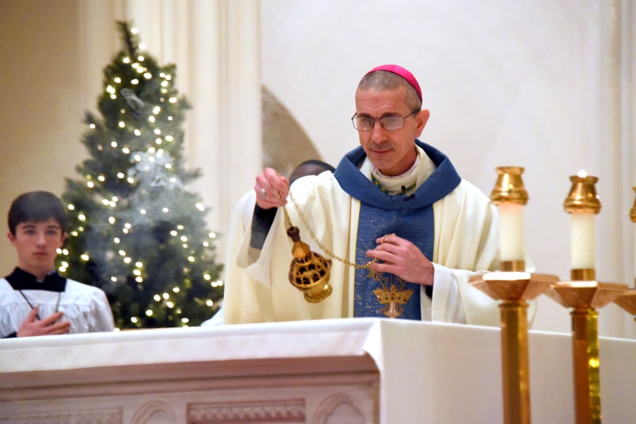 Bishop Ruggieri incenses the altar.